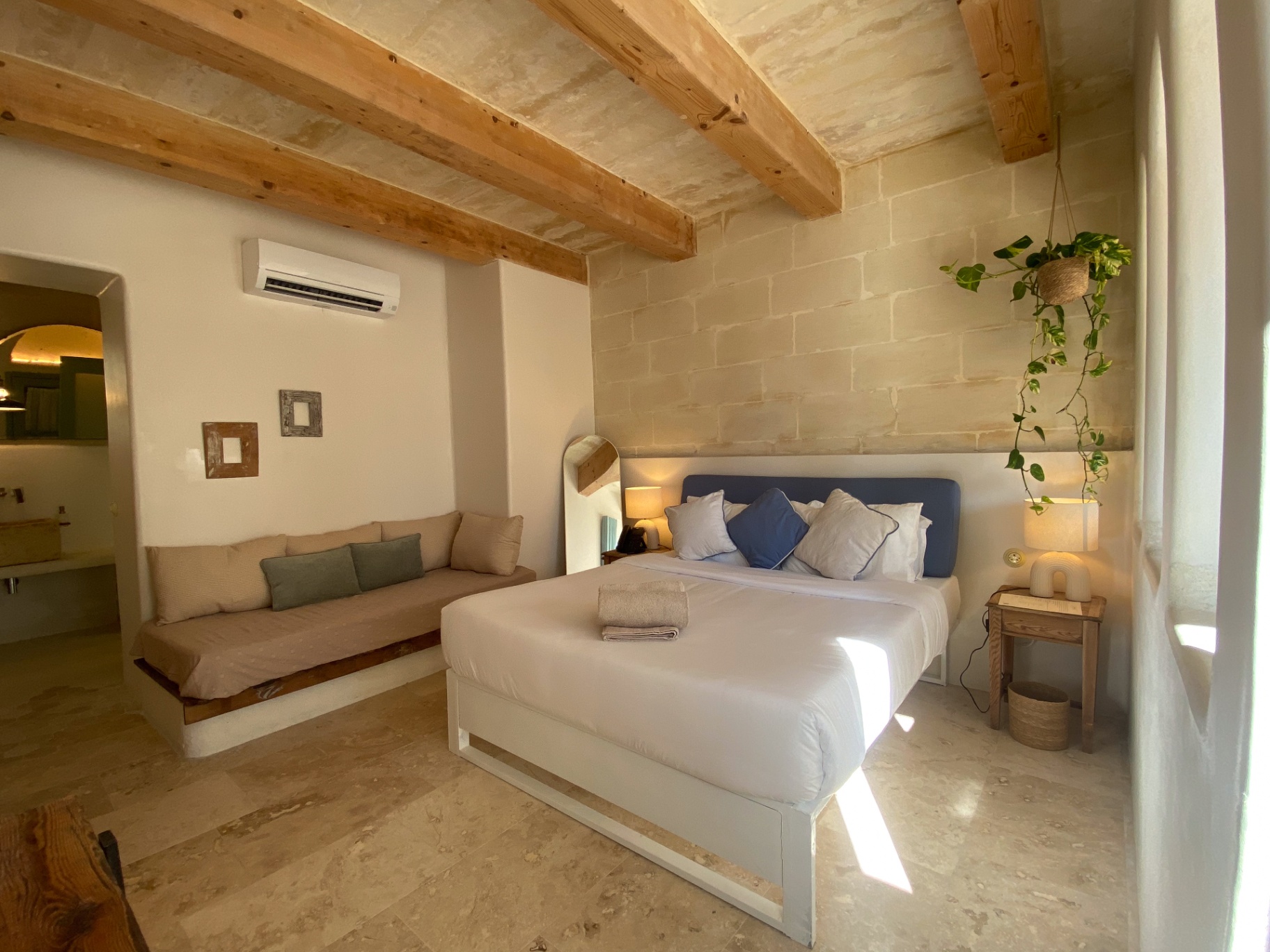 Unit 6 — Beamed suite with arched terrace