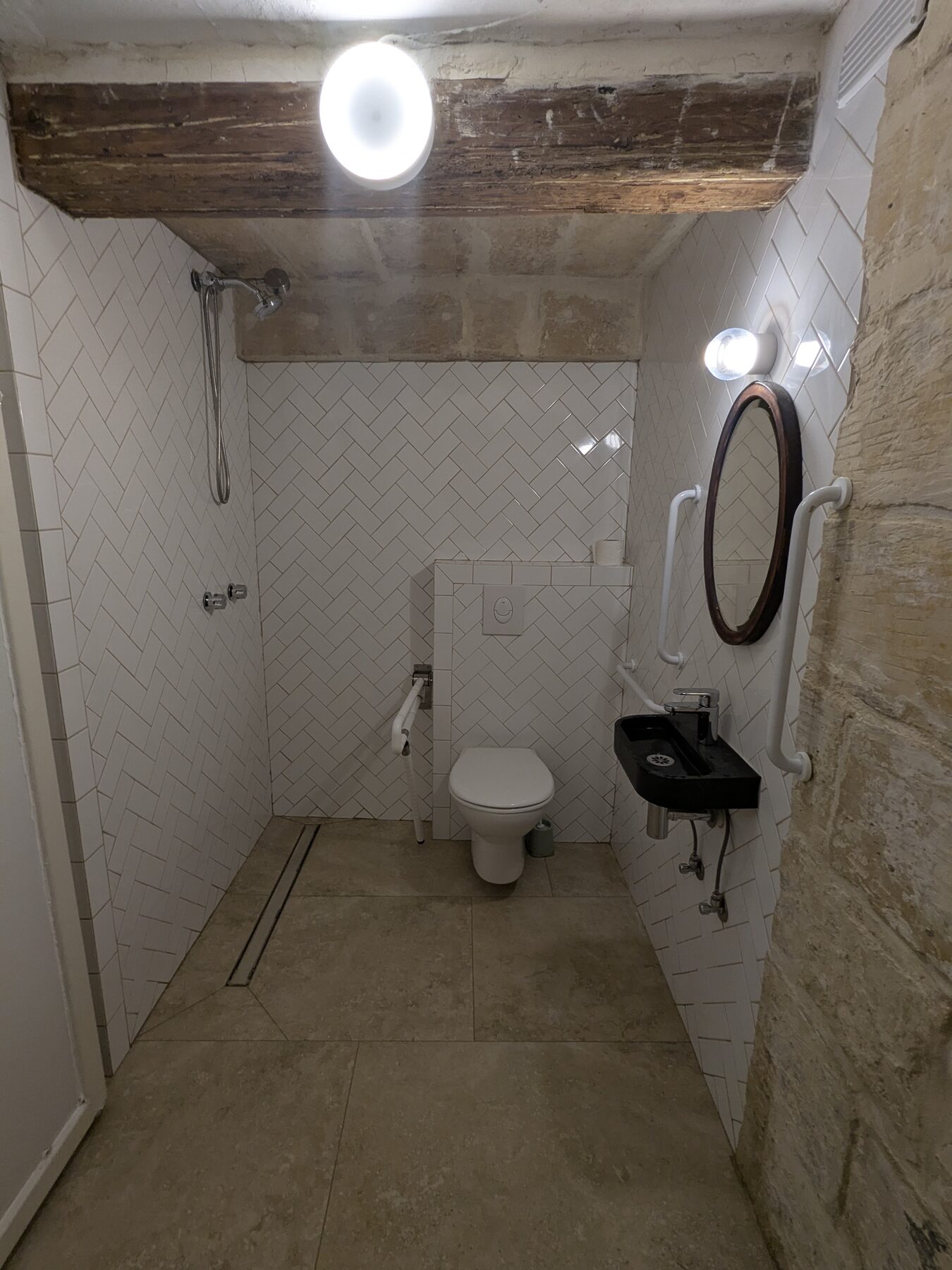 Bathroom with herringbone tile
